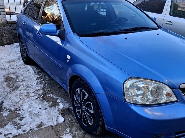 Синий Шевроле Лачетти, объемом двигателя 1.8 л и пробегом 28000 тыс. км за 4000 $, фото 1 на Automoto.ua