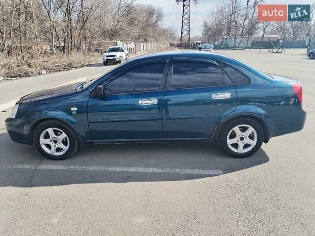 Синий Шевроле Лачетти, объемом двигателя 1.6 л и пробегом 223 тыс. км за 3800 $, фото 1 на Automoto.ua