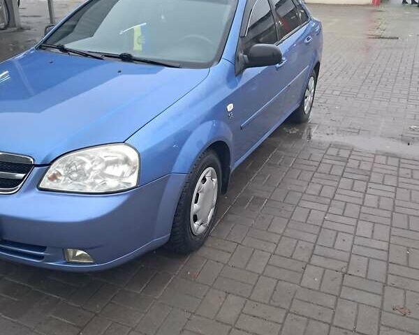 Синий Шевроле Лачетти, объемом двигателя 1.6 л и пробегом 322 тыс. км за 3900 $, фото 1 на Automoto.ua