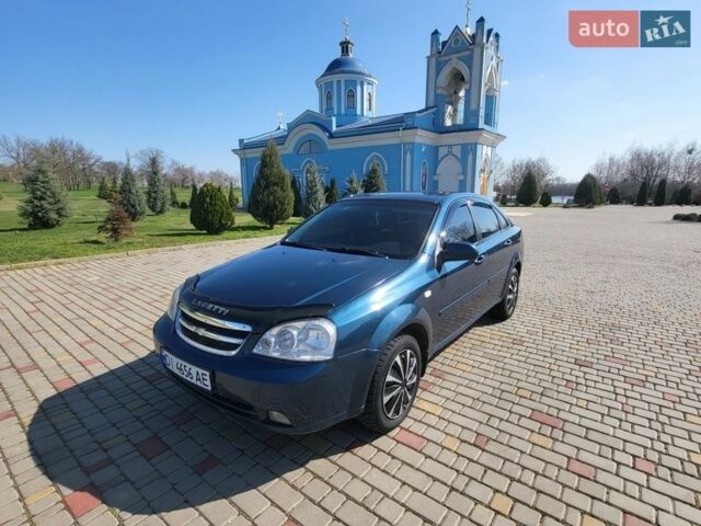 Синий Шевроле Лачетти, объемом двигателя 2 л и пробегом 222 тыс. км за 3700 $, фото 1 на Automoto.ua