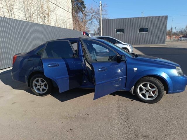 Синий Шевроле Лачетти, объемом двигателя 1.8 л и пробегом 254 тыс. км за 4500 $, фото 1 на Automoto.ua