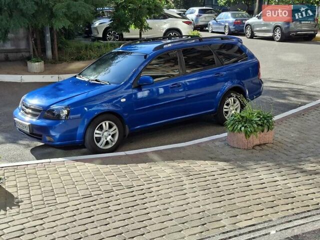 Синій Шевроле Лачетті, об'ємом двигуна 1.8 л та пробігом 214 тис. км за 7000 $, фото 1 на Automoto.ua