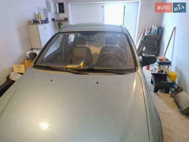 Зеленый Шевроле Лачетти, объемом двигателя 1.6 л и пробегом 249 тыс. км за 2000 $, фото 1 на Automoto.ua