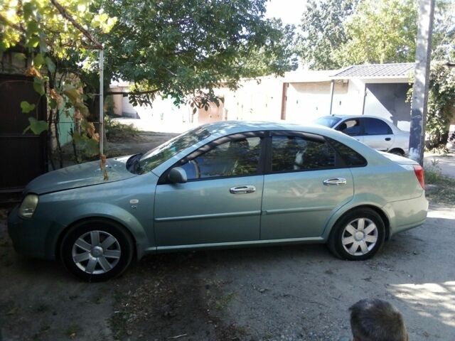 Зеленый Шевроле Лачетти, объемом двигателя 1.8 л и пробегом 250 тыс. км за 3476 $, фото 1 на Automoto.ua