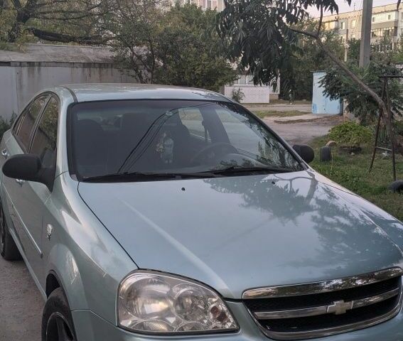 Зеленый Шевроле Лачетти, объемом двигателя 1.4 л и пробегом 215 тыс. км за 4000 $, фото 1 на Automoto.ua