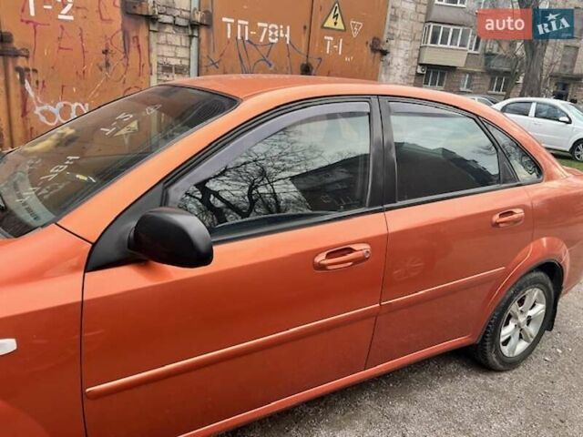 Оранжевый Шевроле Лачетти, объемом двигателя 1.6 л и пробегом 160 тыс. км за 5000 $, фото 1 на Automoto.ua