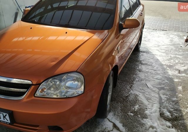 Помаранчевий Шевроле Лачетті, об'ємом двигуна 1.8 л та пробігом 312 тис. км за 3500 $, фото 1 на Automoto.ua