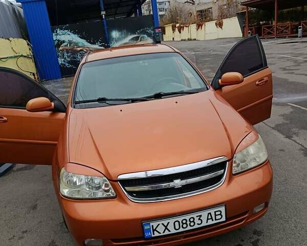Помаранчевий Шевроле Лачетті, об'ємом двигуна 1.8 л та пробігом 218 тис. км за 5700 $, фото 1 на Automoto.ua