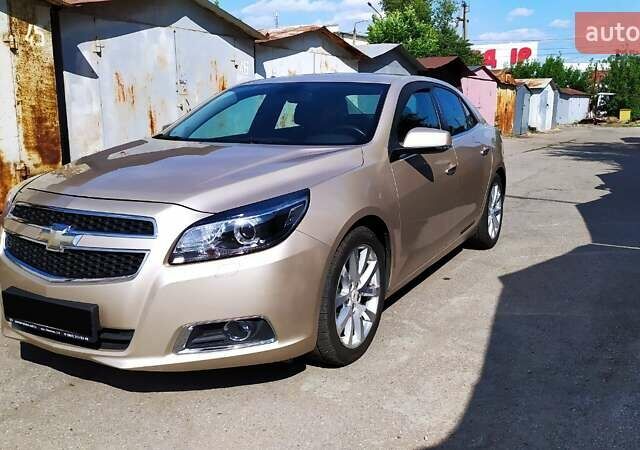 Бежевый Шевроле Малибу, объемом двигателя 2.4 л и пробегом 83 тыс. км за 12500 $, фото 1 на Automoto.ua