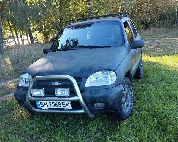 Черный Шевроле Нива, объемом двигателя 1.69 л и пробегом 170 тыс. км за 4000 $, фото 1 на Automoto.ua