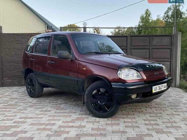 Червоний Шевроле Нива, об'ємом двигуна 1.7 л та пробігом 250 тис. км за 2950 $, фото 1 на Automoto.ua