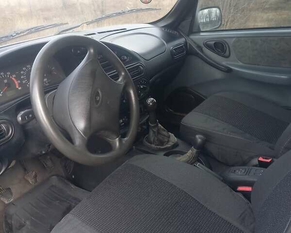 Серый Шевроле Нива, объемом двигателя 1.8 л и пробегом 205 тыс. км за 2841 $, фото 1 на Automoto.ua