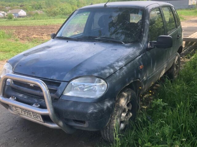 Серый Шевроле Нива, объемом двигателя 1.7 л и пробегом 150 тыс. км за 1700 $, фото 1 на Automoto.ua