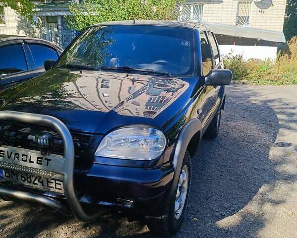 Синий Шевроле Нива, объемом двигателя 1.69 л и пробегом 225 тыс. км за 3800 $, фото 1 на Automoto.ua