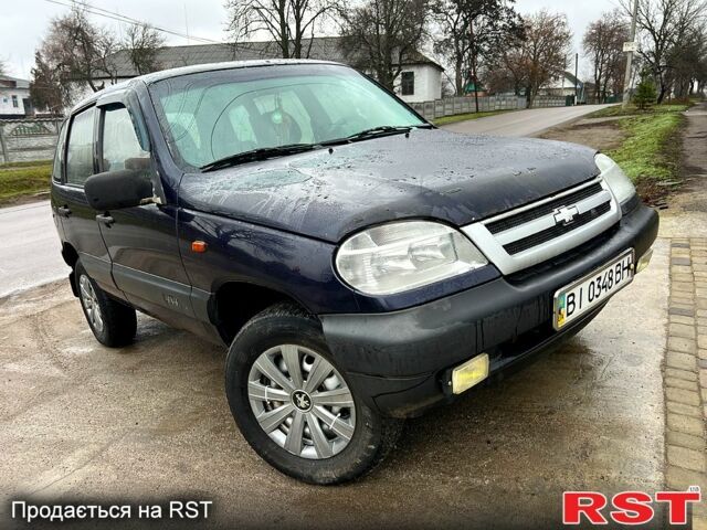 Синий Шевроле Нива, объемом двигателя 1.7 л и пробегом 170 тыс. км за 2450 $, фото 1 на Automoto.ua