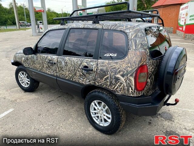 Зеленый Шевроле Нива, объемом двигателя 1.7 л и пробегом 263 тыс. км за 4700 $, фото 1 на Automoto.ua