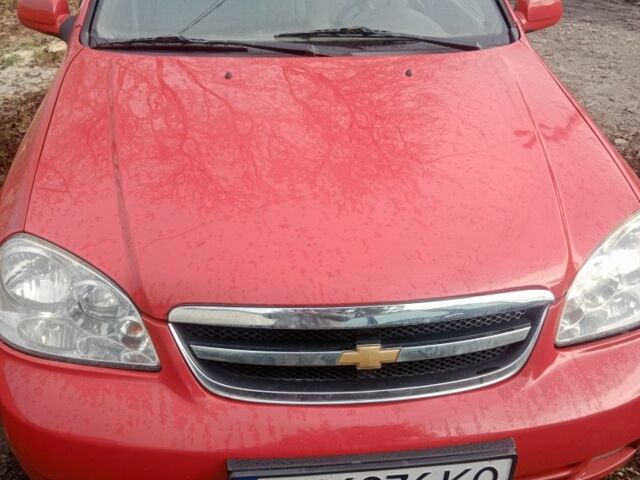 Красный Шевроле Нубира, объемом двигателя 1.8 л и пробегом 206 тыс. км за 3000 $, фото 1 на Automoto.ua