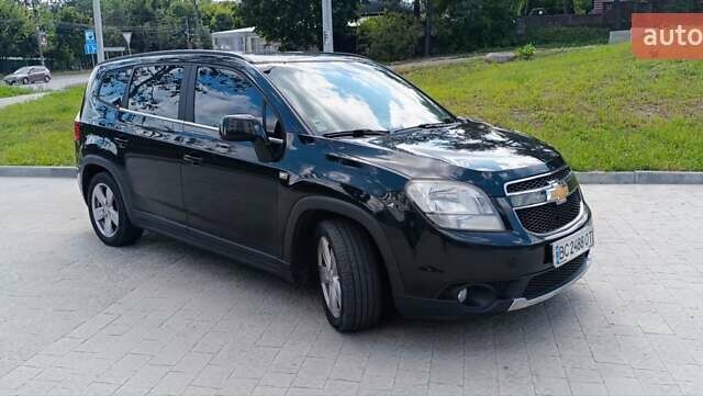 Черный Шевроле Орландо, объемом двигателя 2 л и пробегом 215 тыс. км за 8400 $, фото 1 на Automoto.ua