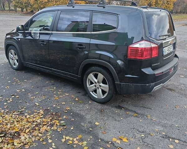 Шевроле Орландо 2012 в Броварах на Automoto.ua Черный Шевроле Орландо, объемом двигателя 2 л и пробегом 210 тыс. км за 8800 $, фото 1 на Automoto.ua