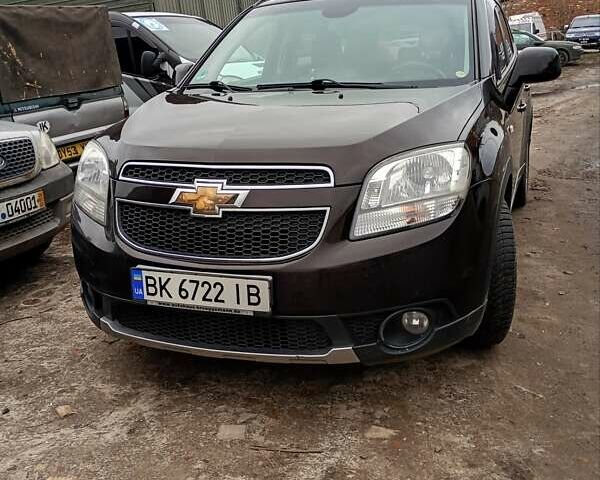 Коричневый Шевроле Орландо, объемом двигателя 2 л и пробегом 317 тыс. км за 9800 $, фото 1 на Automoto.ua