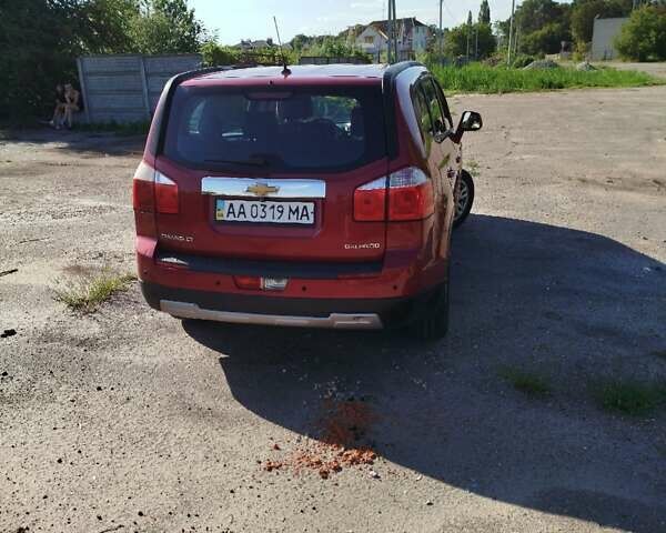 Красный Шевроле Орландо, объемом двигателя 1.8 л и пробегом 255 тыс. км за 8000 $, фото 1 на Automoto.ua