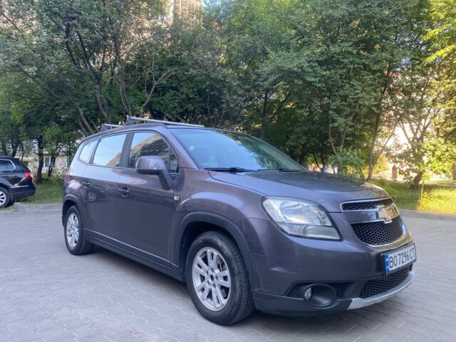 Серый Шевроле Орландо, объемом двигателя 1.8 л и пробегом 210 тыс. км за 8500 $, фото 1 на Automoto.ua