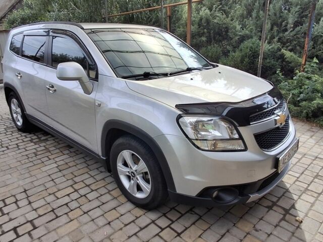 Серый Шевроле Орландо, объемом двигателя 1.8 л и пробегом 182 тыс. км за 9600 $, фото 1 на Automoto.ua