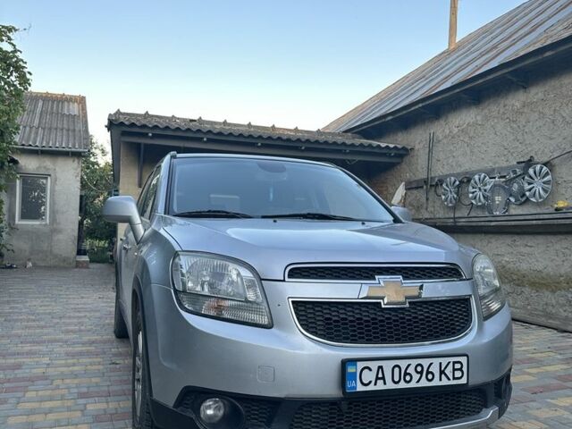Сірий Шевроле Орландо, об'ємом двигуна 2 л та пробігом 195 тис. км за 8823 $, фото 1 на Automoto.ua