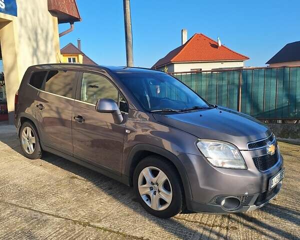 Серый Шевроле Орландо, объемом двигателя 2 л и пробегом 255 тыс. км за 9000 $, фото 1 на Automoto.ua