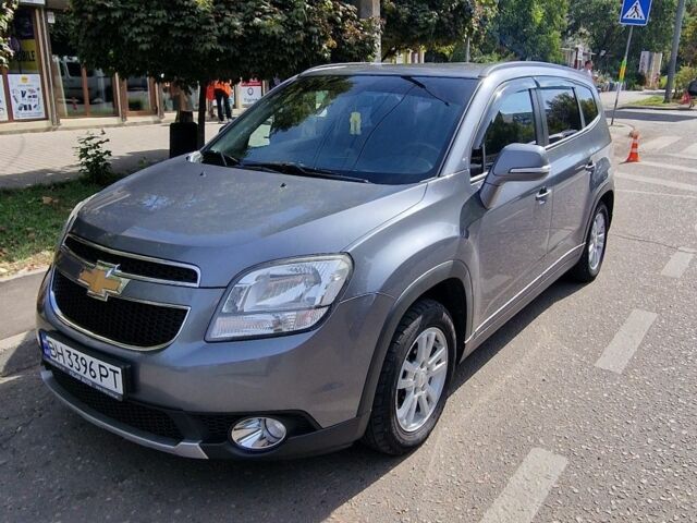 Серый Шевроле Орландо, объемом двигателя 1.6 л и пробегом 247 тыс. км за 11100 $, фото 1 на Automoto.ua