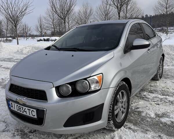 Серый Шевроле Соник, объемом двигателя 1.8 л и пробегом 192 тыс. км за 6400 $, фото 1 на Automoto.ua