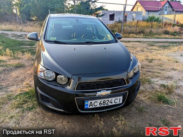 Серый Шевроле Соник, объемом двигателя 1.8 л и пробегом 129 тыс. км за 7000 $, фото 1 на Automoto.ua