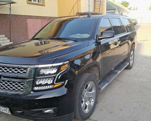 Черный Шевроле Субурбан, объемом двигателя 5.3 л и пробегом 157 тыс. км за 42000 $, фото 1 на Automoto.ua