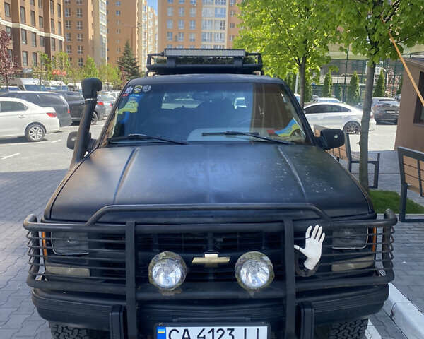 Чорний Шевроле Тахо, об'ємом двигуна 5.7 л та пробігом 180 тис. км за 7000 $, фото 1 на Automoto.ua