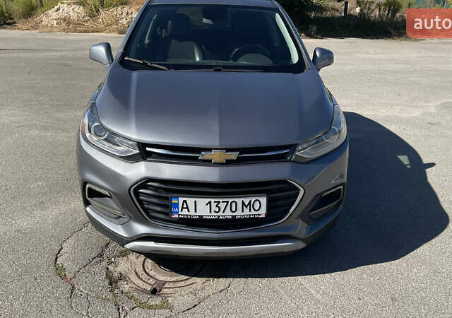 Серый Шевроле Trax, объемом двигателя 1.4 л и пробегом 115 тыс. км за 10000 $, фото 1 на Automoto.ua