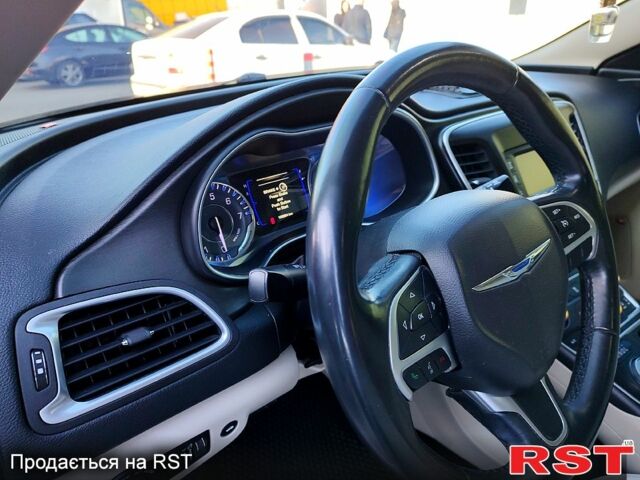 Белый Крайслер 200, объемом двигателя 2.4 л и пробегом 125 тыс. км за 9500 $, фото 1 на Automoto.ua