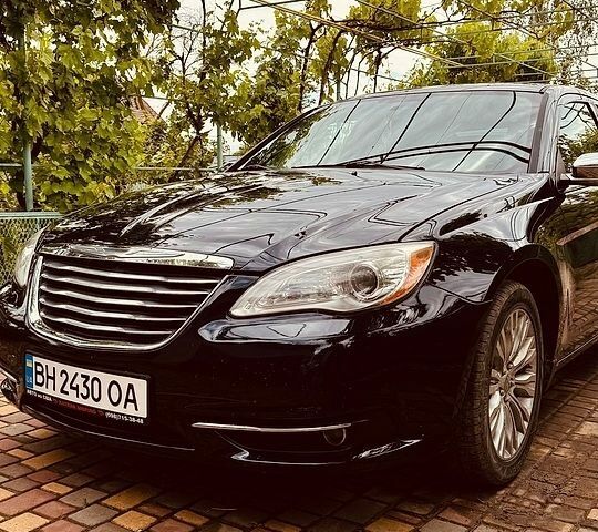 Синий Крайслер 200, объемом двигателя 2.36 л и пробегом 208 тыс. км за 6500 $, фото 1 на Automoto.ua