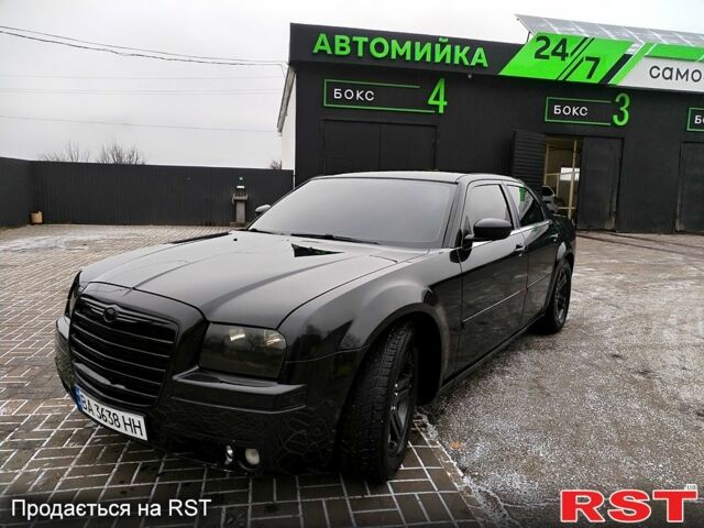 Черный Крайслер 300C, объемом двигателя 2.7 л и пробегом 120 тыс. км за 9900 $, фото 1 на Automoto.ua