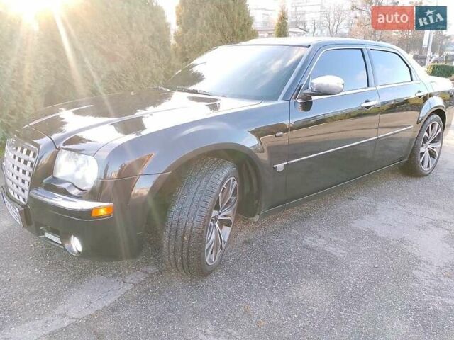 Черный Крайслер 300C, объемом двигателя 3.5 л и пробегом 202 тыс. км за 7593 $, фото 1 на Automoto.ua
