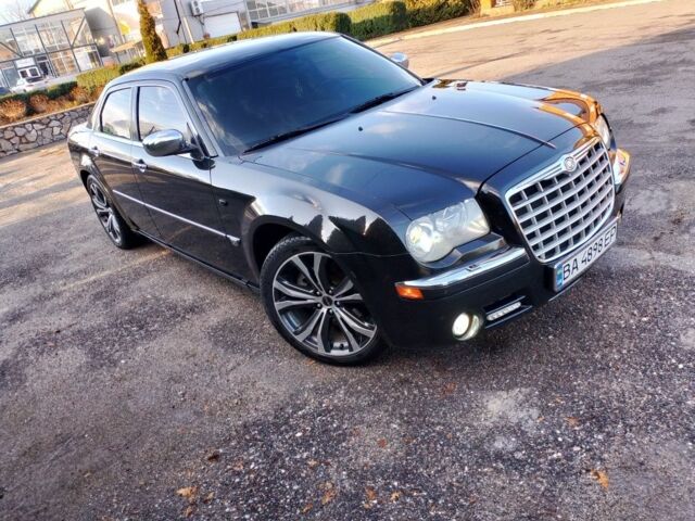Черный Крайслер 300C, объемом двигателя 3.5 л и пробегом 202 тыс. км за 7593 $, фото 1 на Automoto.ua