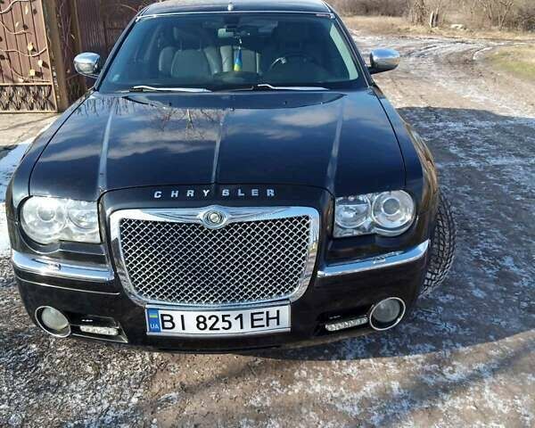 Черный Крайслер 300C, объемом двигателя 2.7 л и пробегом 183 тыс. км за 7500 $, фото 1 на Automoto.ua