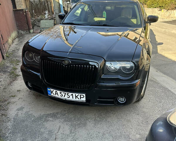 Черный Крайслер 300C, объемом двигателя 2.7 л и пробегом 265 тыс. км за 7000 $, фото 1 на Automoto.ua