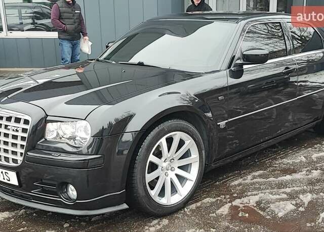Черный Крайслер 300C, объемом двигателя 2.74 л и пробегом 220 тыс. км за 10500 $, фото 1 на Automoto.ua