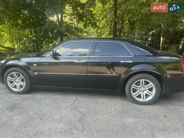 Чорний Крайслер 300C, об'ємом двигуна 5.65 л та пробігом 140 тис. км за 9500 $, фото 1 на Automoto.ua