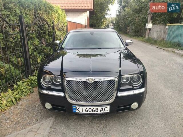 Черный Крайслер 300C, объемом двигателя 3.5 л и пробегом 271 тыс. км за 8990 $, фото 1 на Automoto.ua