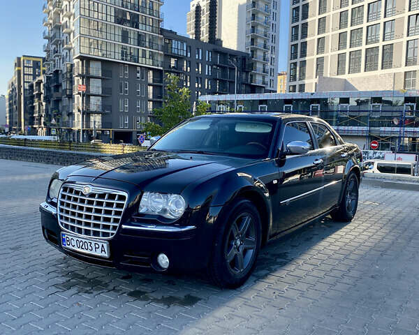 Черный Крайслер 300C, объемом двигателя 3.5 л и пробегом 251 тыс. км за 8800 $, фото 1 на Automoto.ua