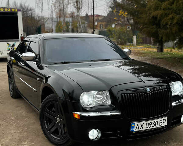 Черный Крайслер 300C, объемом двигателя 2.7 л и пробегом 138 тыс. км за 8800 $, фото 1 на Automoto.ua