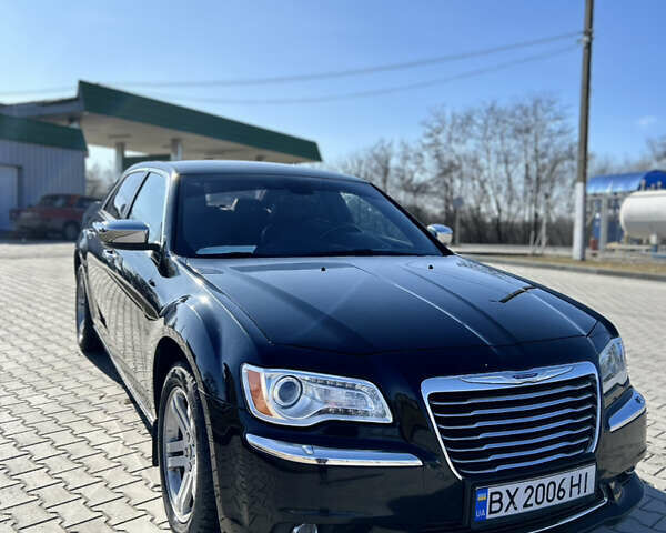 Черный Крайслер 300C, объемом двигателя 3 л и пробегом 170 тыс. км за 12900 $, фото 1 на Automoto.ua