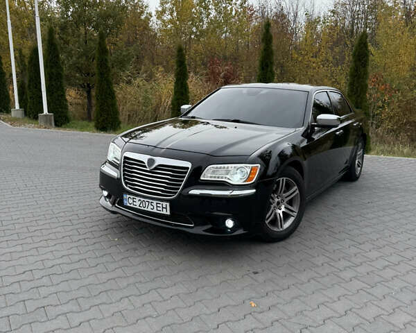 Черный Крайслер 300C, объемом двигателя 3 л и пробегом 280 тыс. км за 13000 $, фото 1 на Automoto.ua