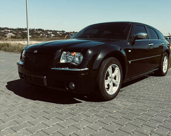 Черный Крайслер 300C, объемом двигателя 3 л и пробегом 300 тыс. км за 7599 $, фото 1 на Automoto.ua